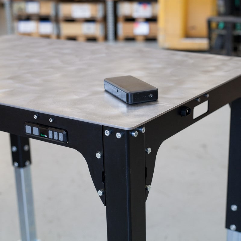Adjustable arbejdsbord og svejsebord der kan hæve og sænke via batteri